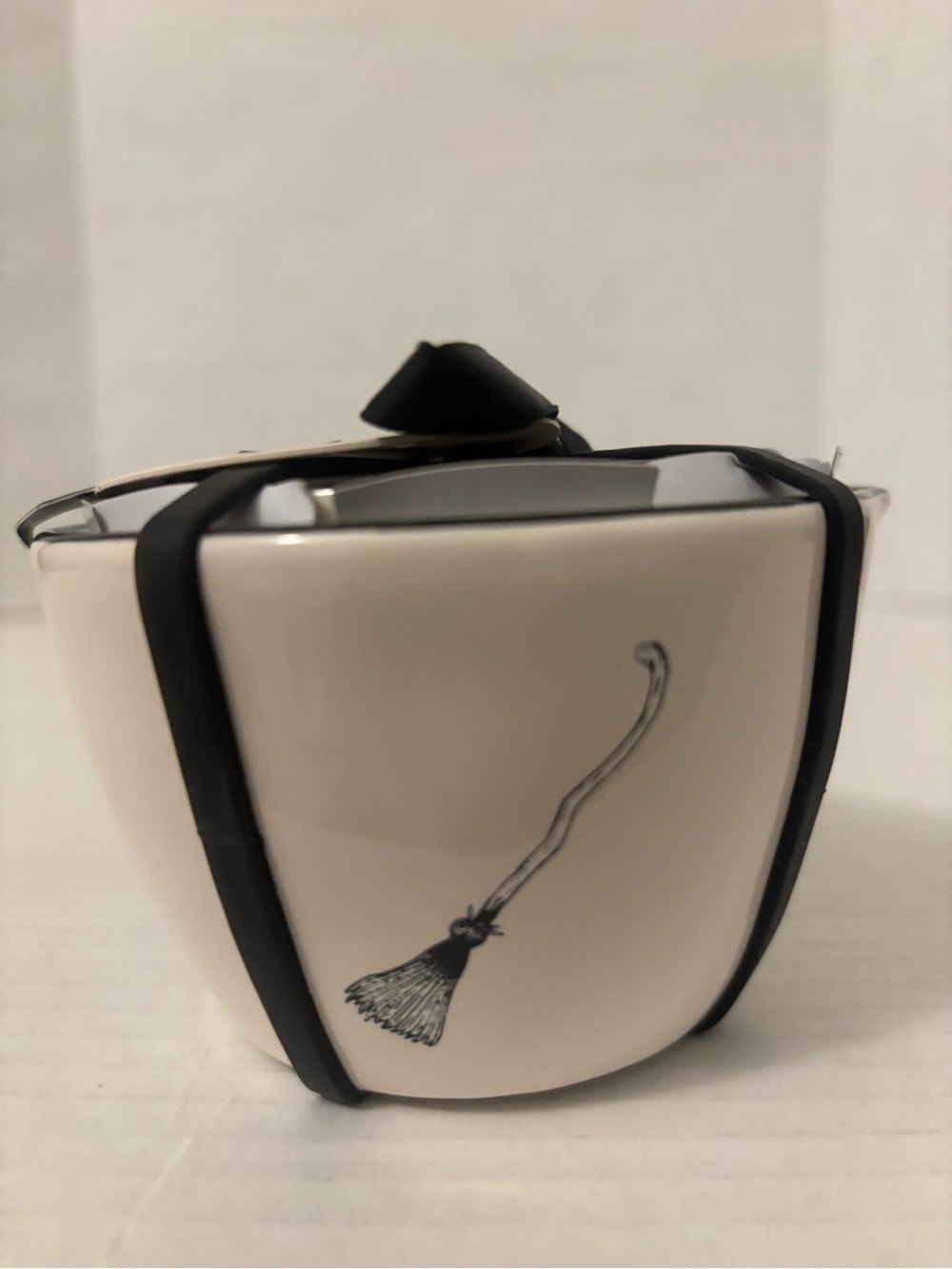 Rae Dunn White Ceramic Tea Infuser Cup with Black Broom Motif